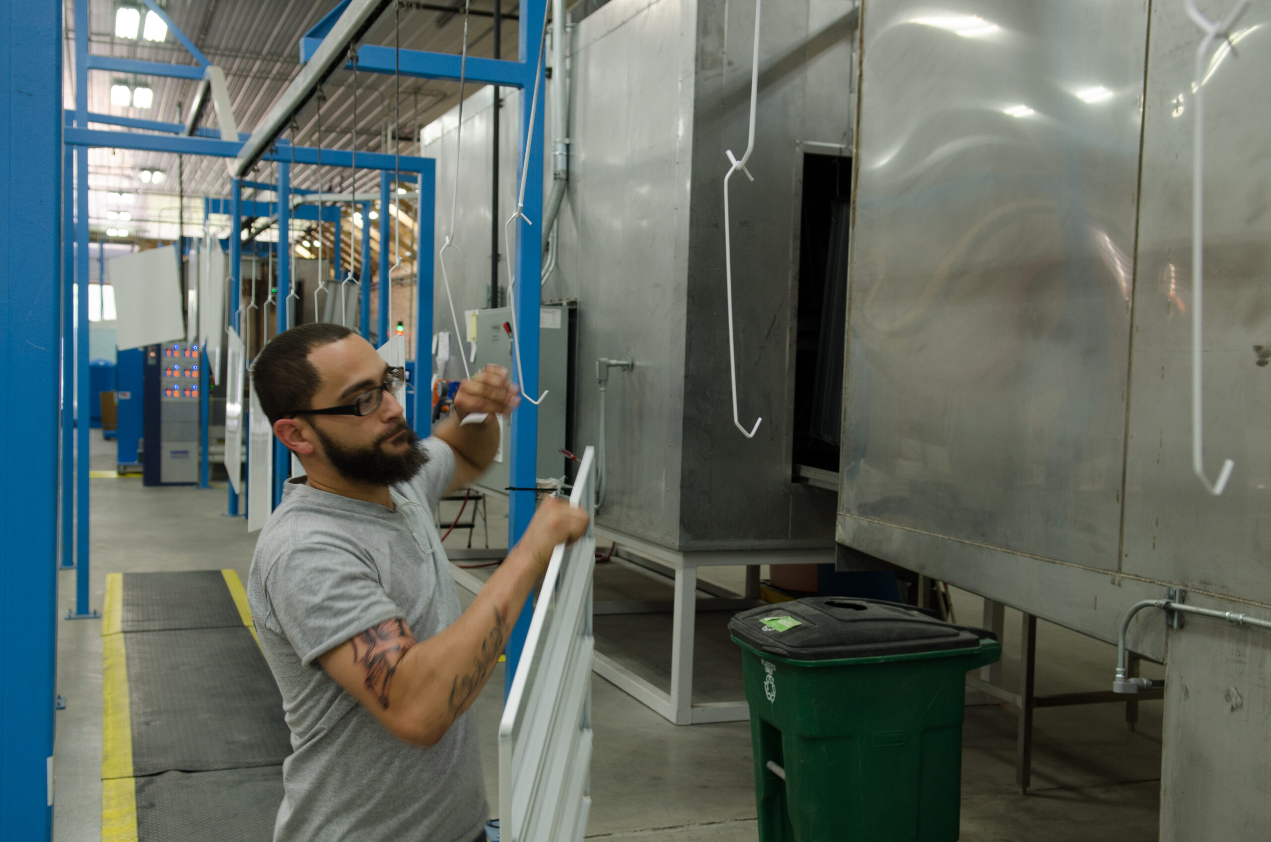 A worker doing metal fabrication