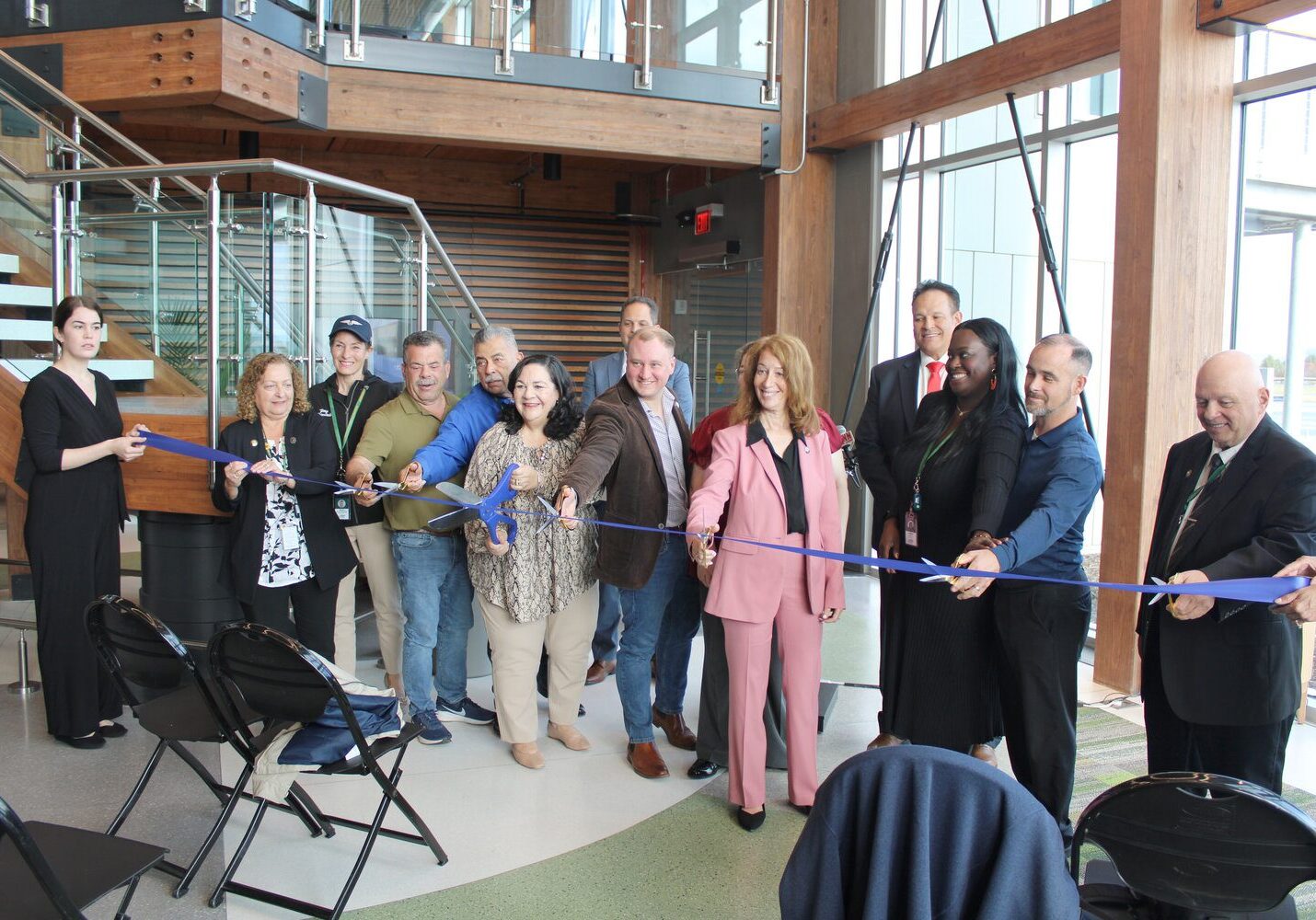 County legislators join New York DOT Commissioner Marie Therese Dominguez and Assemblywoman Paula Kay in cutting the ribbon for the new Sullivan County International Airport in Swan Lake.
Photo Credit: Vincent Kurzrock | Democrat